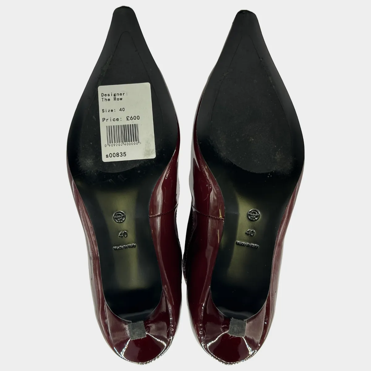 The Row women's burgundy patent leather ankle boots
