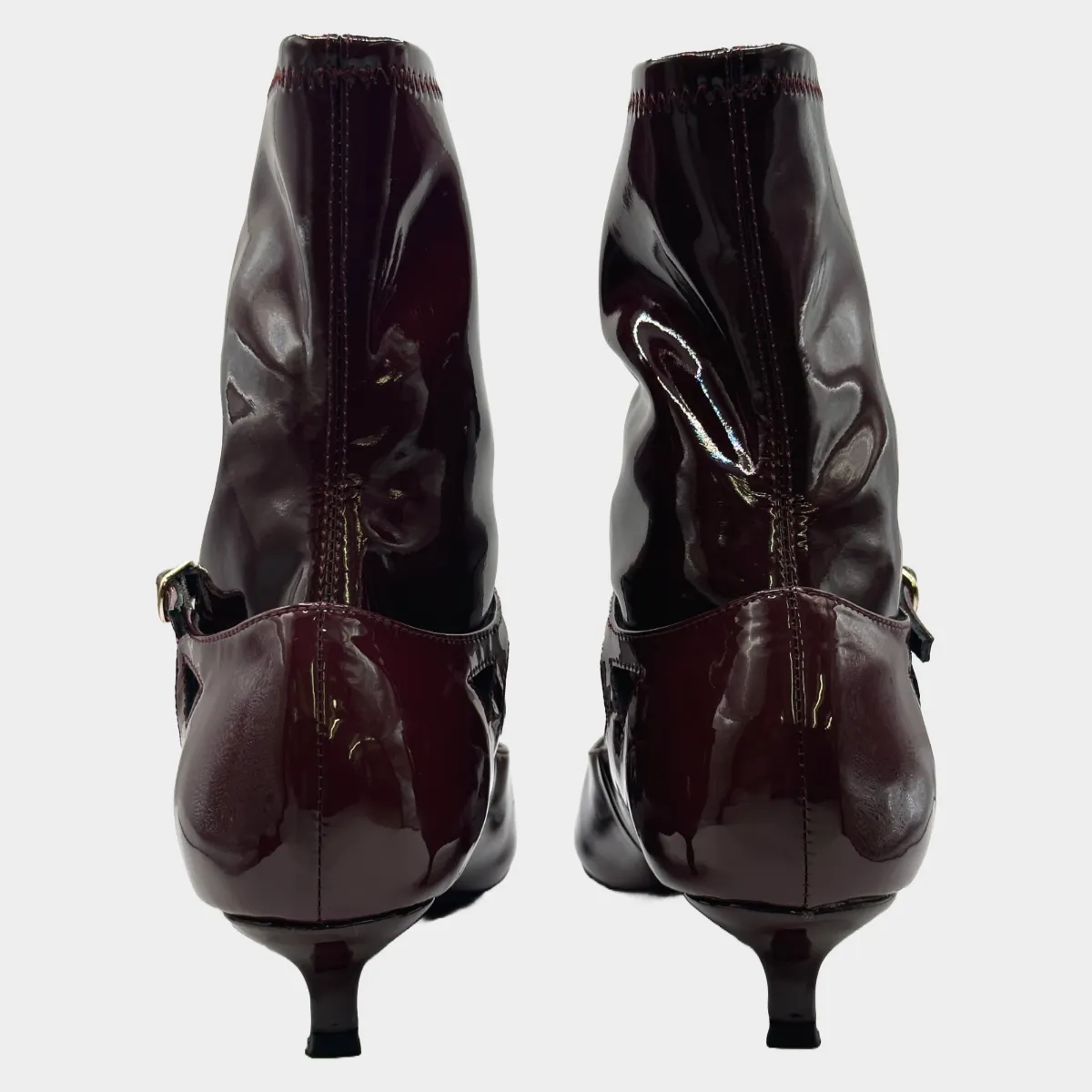 The Row women's burgundy patent leather ankle boots